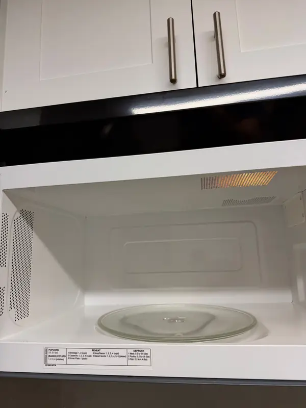The same microwave interior, clean after the job