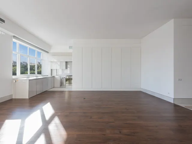 Bright, spotless newly finished apartment with white cabinetry and hardwood floors